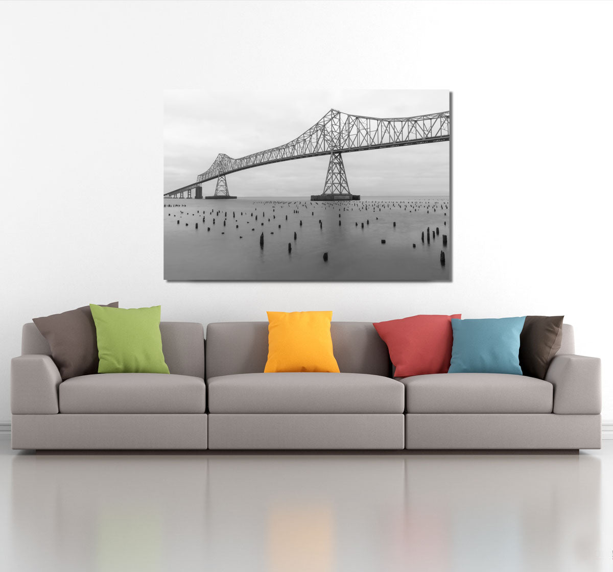 Photograph of a bridge super imposed over a couch as if the artwork were purchased and hanging in a living room.  Clicking here takes you to a collection of black and white images.